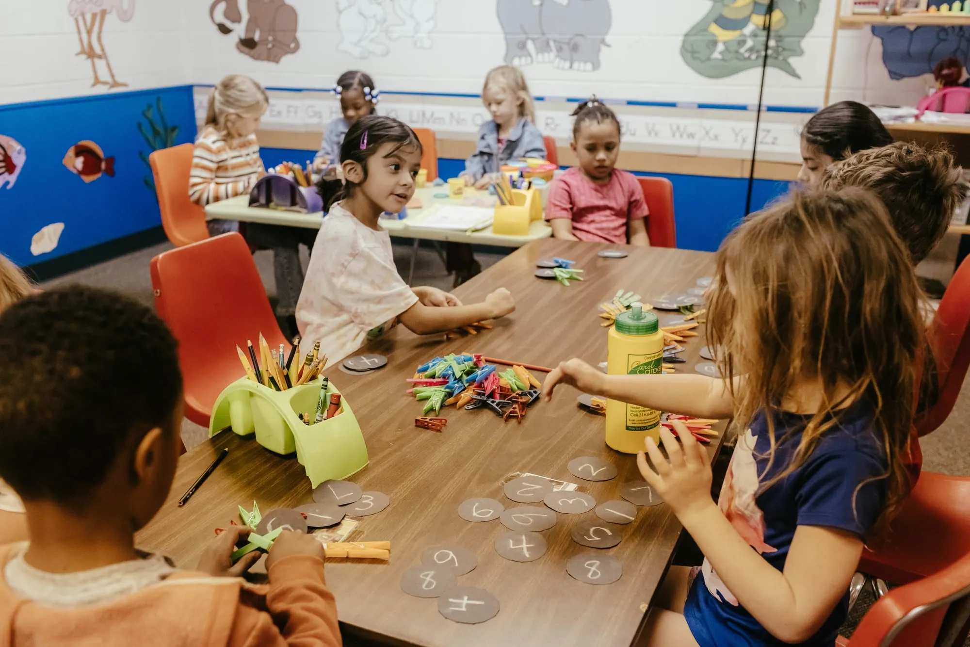 Young students working on a hands-on math activity